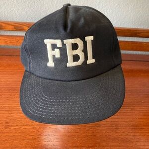 FBI Baseball Cap Black with White letters ponytail pinned on